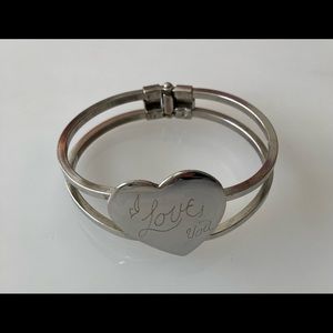 Bangle with a heart , engraved “I Love You.